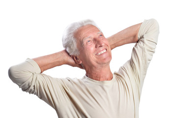 Obraz premium Portrait of happy senior man posing on white background