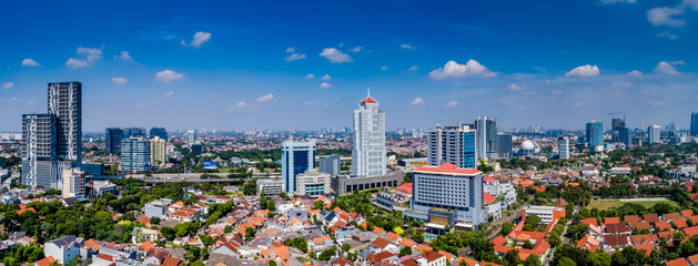 Fototapeta na wymiar Aerial View of Jakarta Cityscape with Blue Sky