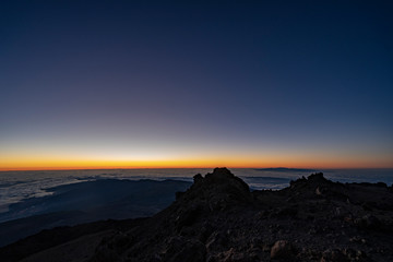 Sun is rising over Canary Islands, seen  from near the summit of Teide Mountain, Tenerife, Canary Islands, Spain