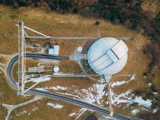 Special astrophysical observatory in the evening. Top view from drone.