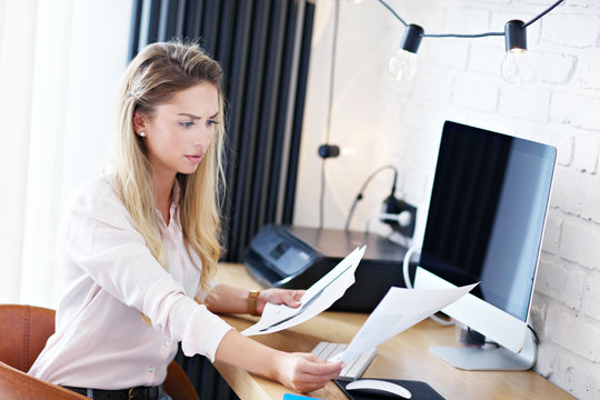 Portrait Of Beautiful Millennial Woman Working In Modern Home Office