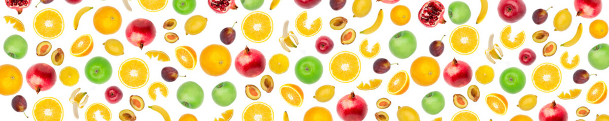 Wide panoramic collage fresh fruit isolated on white background. Bananas, citrus fruits, apples, plums, pomegranate, lemons. Skinali food