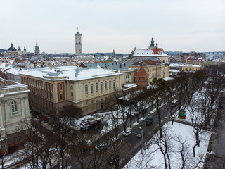 old european city aerial view in winter time. snowed roofs