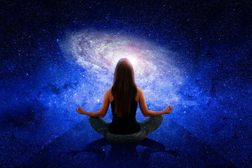 Woman in meditation in nature