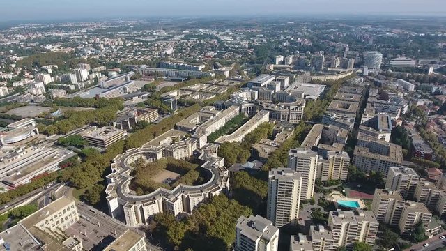 Flying around Montpellier Antigone neighbourhood aerial view. Key shape buildings France