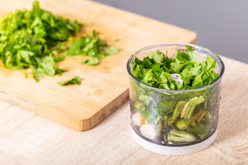 hot green pepper and cilantro in a blender