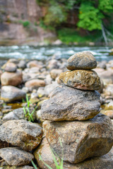 Fototapeta na wymiar Rock, stone stack on the river bank, Latvia