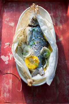 Sea bream in greaseproof paper