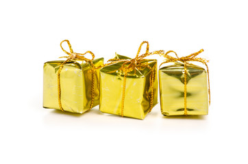 Christmas toys golden gifts box on a white background. Isolation