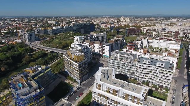 Quartier Port Marianne modern district Montpellier with river Lez aerial drone shot