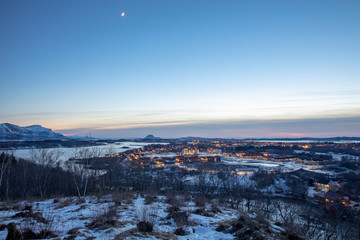 View from a hill outside the city towards the town and the mountain Torghatten; County of Nordland