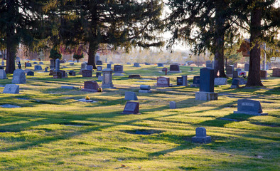 cemetery at sunset, cemetery, gravestones, markers, death, died, grass,shadows, granite, stone,...