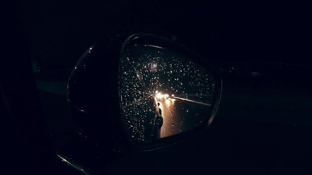 side car mirror during night driving