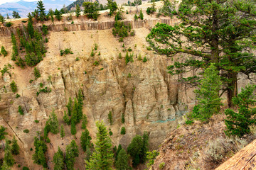 Fototapeta premium Yellowstone Grand Canyon, this deep valley in the Wyoming Yellowstone national park is visited by thousands of people from all over the world