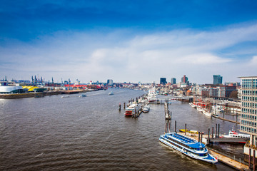 Fototapeta na wymiar View of a Hamburg harbour on a beautiful early spring day