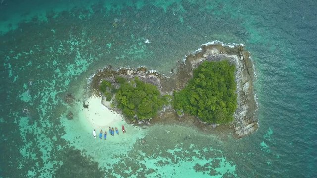 Aerial view of the Rokroy island, beautiful clear emerald sea, aerial drone view on tropical island, Ko Lipe, Thailand.