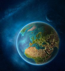 Planet Earth with highlighted Croatia in space with Moon and Milky Way. Visible city lights and country borders.