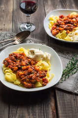 Pappardelle pasta with meat ragout and burrata cheese