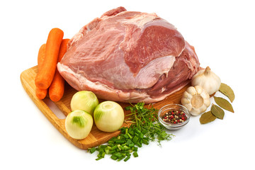 Raw Whole Appetizing Gammon with vegetables on a cutting board, isolated on a white background. Close-up
