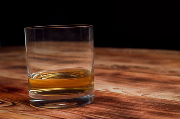 Glasses for whiskey on a wooden table