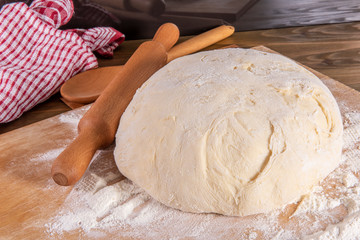 bread dough on a cutting board