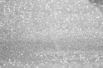 Obraz premium Blurred of Silver foil effect make many bokeh for abstract background