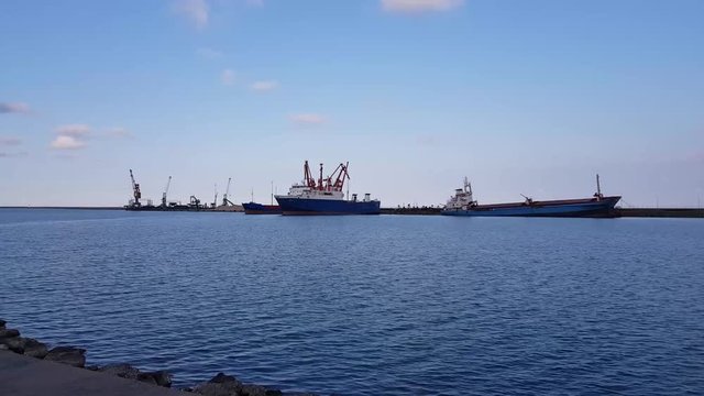 Abandoned Ship Wessel in Harbour Sea Side Crains