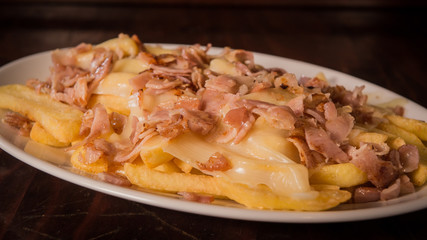 French fries with bacon and cheese