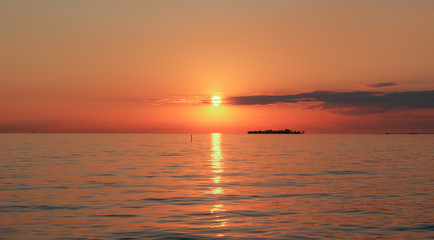 Beautiful cloudscape over the sea, sunset .