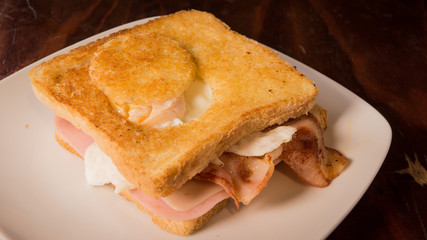 Fried egg sandwich with bacon