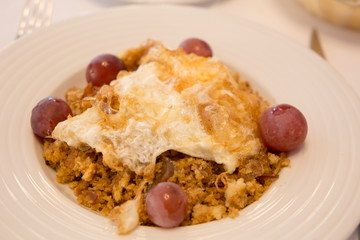 Migas Bread crumbs with ham and grapes Typical in Spain