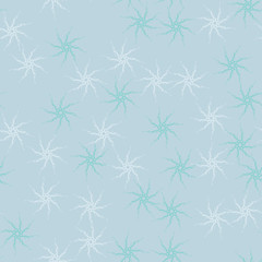 Winter seamless pattern with chaotic snowflakes in different shades of blue color