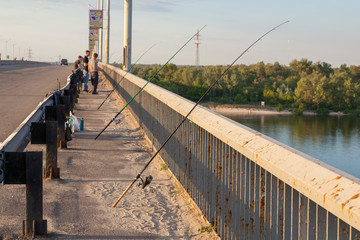 Man fishing on the bridge