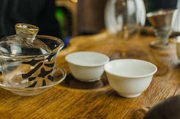 Chinese tea ceremony with Anchnag on wooden background