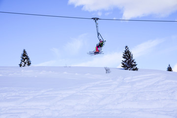 skilifts in the Alps on a sunny winter day