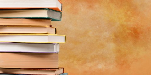 Old Books stacked on background.