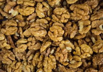 Walnuts background. Kernels walnuts. Top view. Vegetarian or healthy eating.