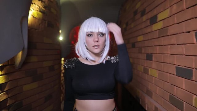 Sexy unusual girl going to me throught red light corridor