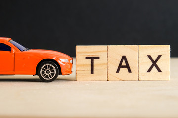The concept of paying taxes on the car. The word 
