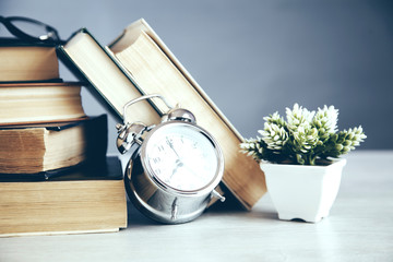 vintage clock and  books