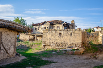 Fototapeta na wymiar Old and adobe village houses