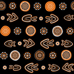 Australian aboriginal seamless vector pattern with dotted circles, rings and boomerangs