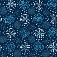Christmas seamless pattern with snowflakes. Blue wrapping paper. Textile design, interior decor and New Year pattern.
