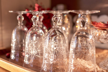 Closeup of vintage crystal glassware on the buffet, ready for holiday party