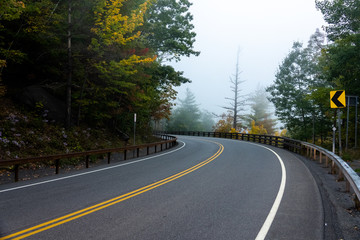 Early autumn road thru mountain range