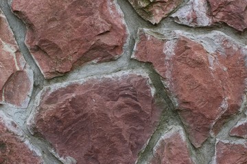 A coarse stone texture close up