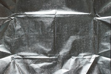 A silver wrapper of chocolate close-up