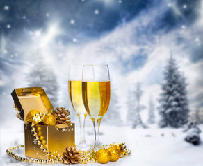 Glasses of champagne on holiday background
