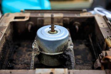 Old rusted motor in metal enclosure