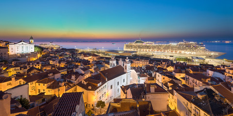 Old town of Lisbon, Portugal with docked cruise ship